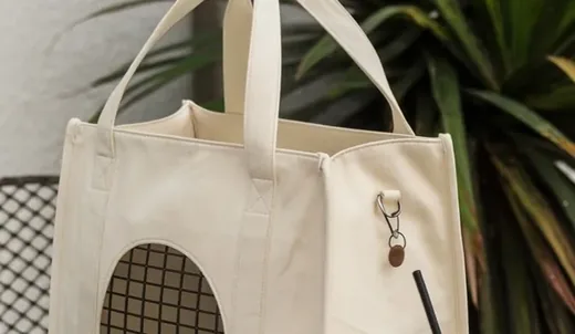 Bolso transportador de tela cosido a mano